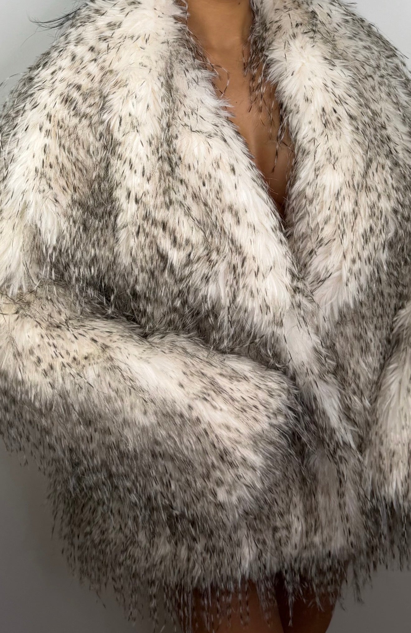 Pelliccia bianca sfumata dal finish raffinato